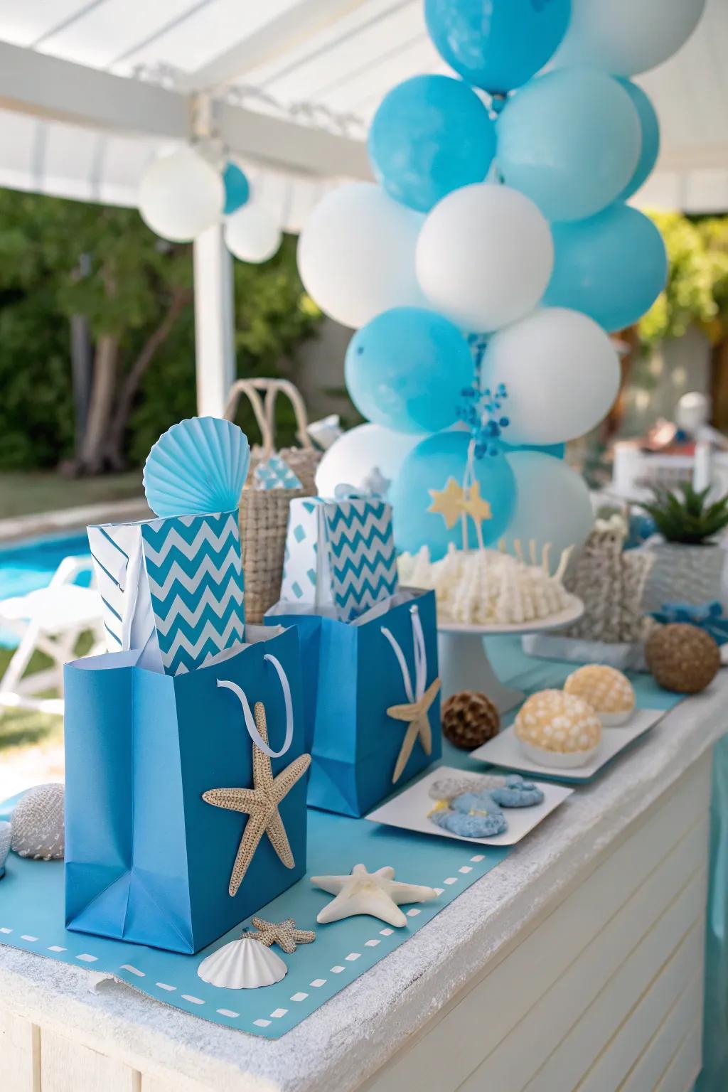 Color-coordinated party favor table with a sea-inspired theme.