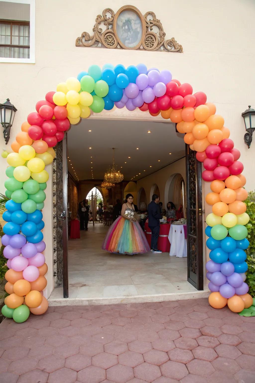 A magnificent balloon arch bids welcome to the quinceanera.
