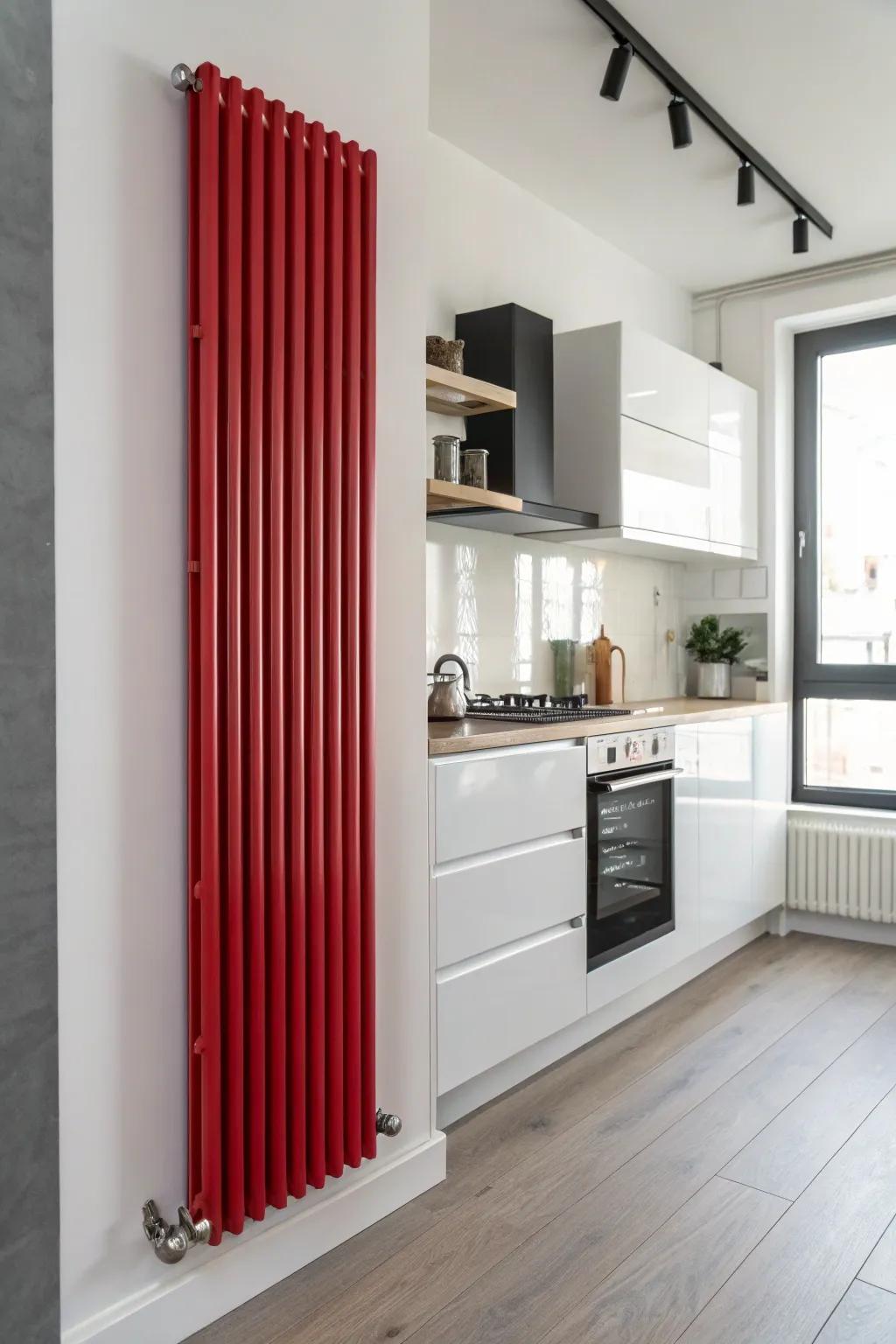 A vibrant red radiator energizes a neutral kitchen.