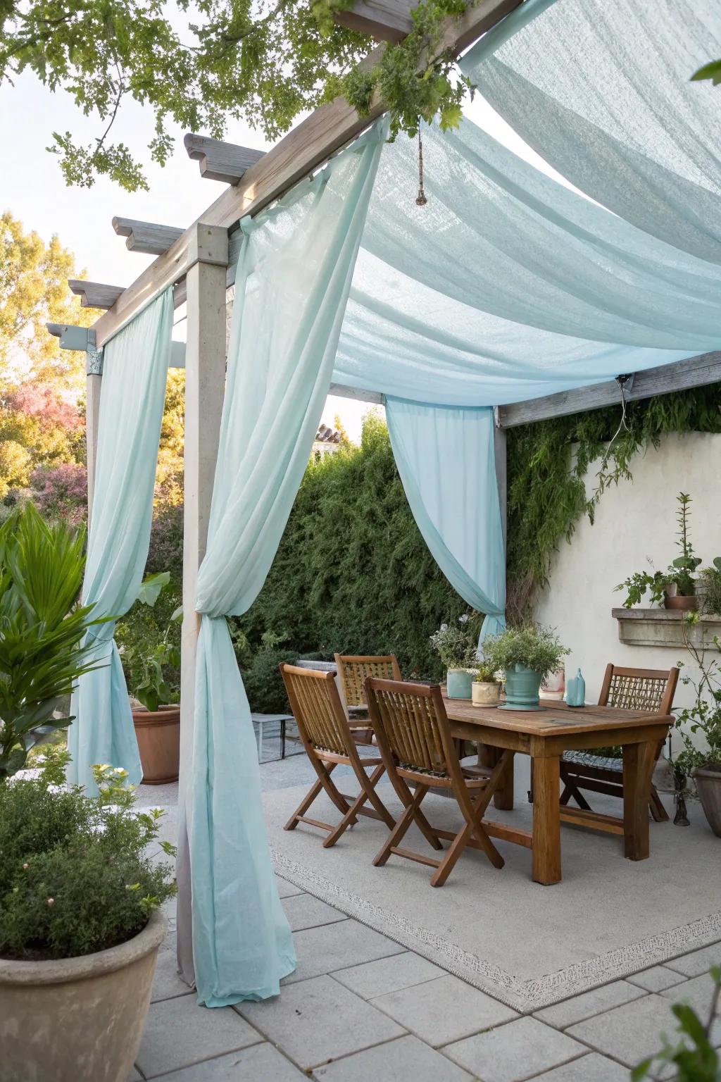 A DIY fabric canopy provides shade on a patio.