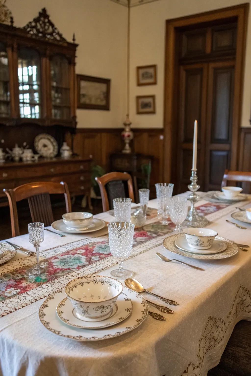 A vintage table arrangement featuring antique tableware and linens.