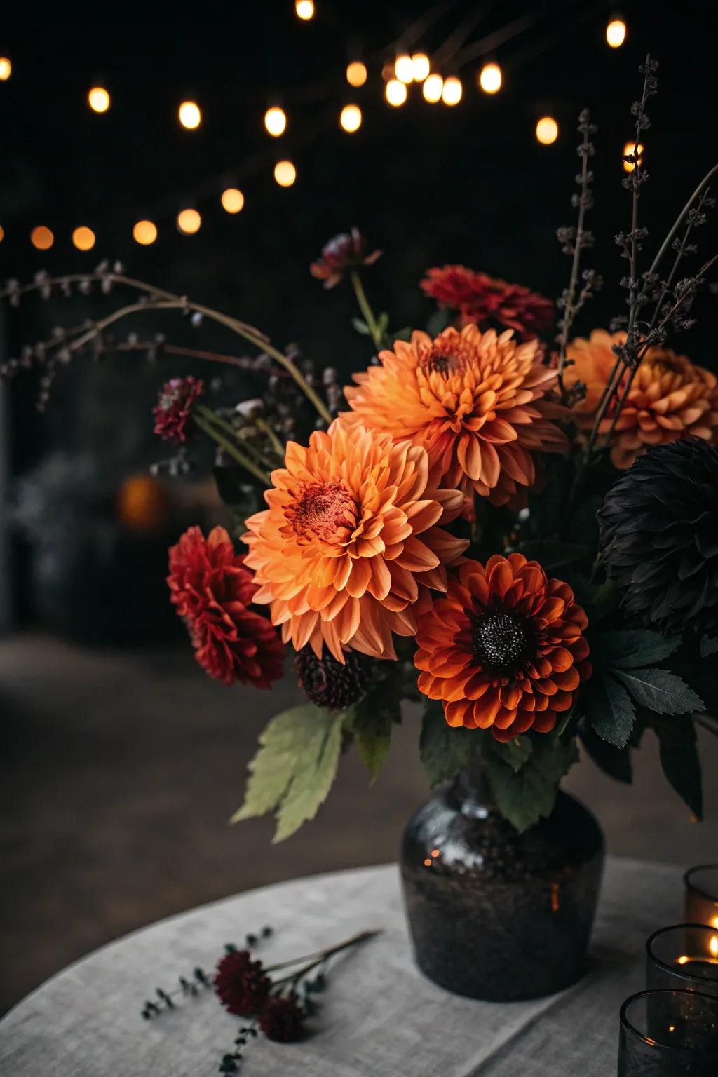 Orange and black dahlias make a bold statement in floral designs.