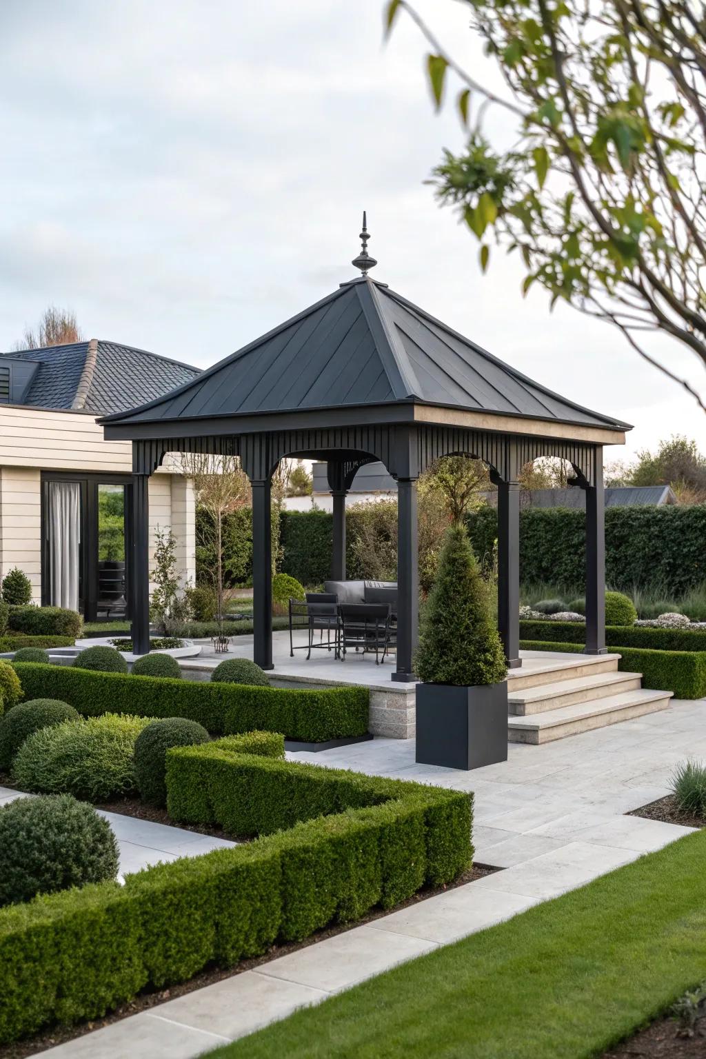 A gazebo with a dark canopy, presenting a polished and modern feature.