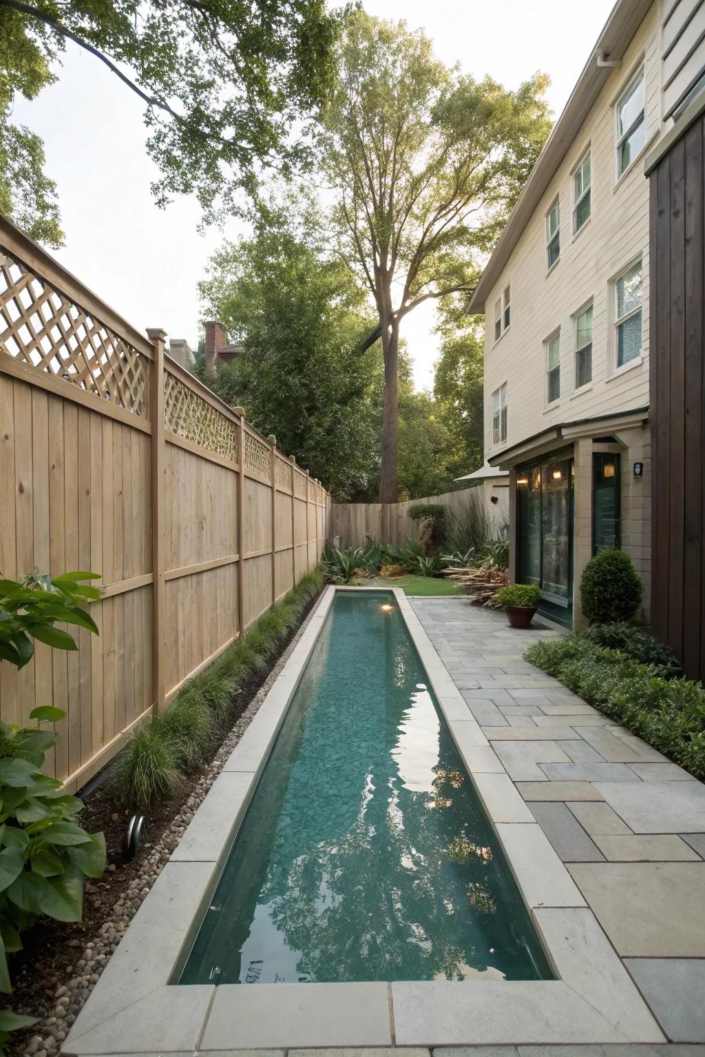 Edge-to-edge pool placement maximizes space utilization in small yards.