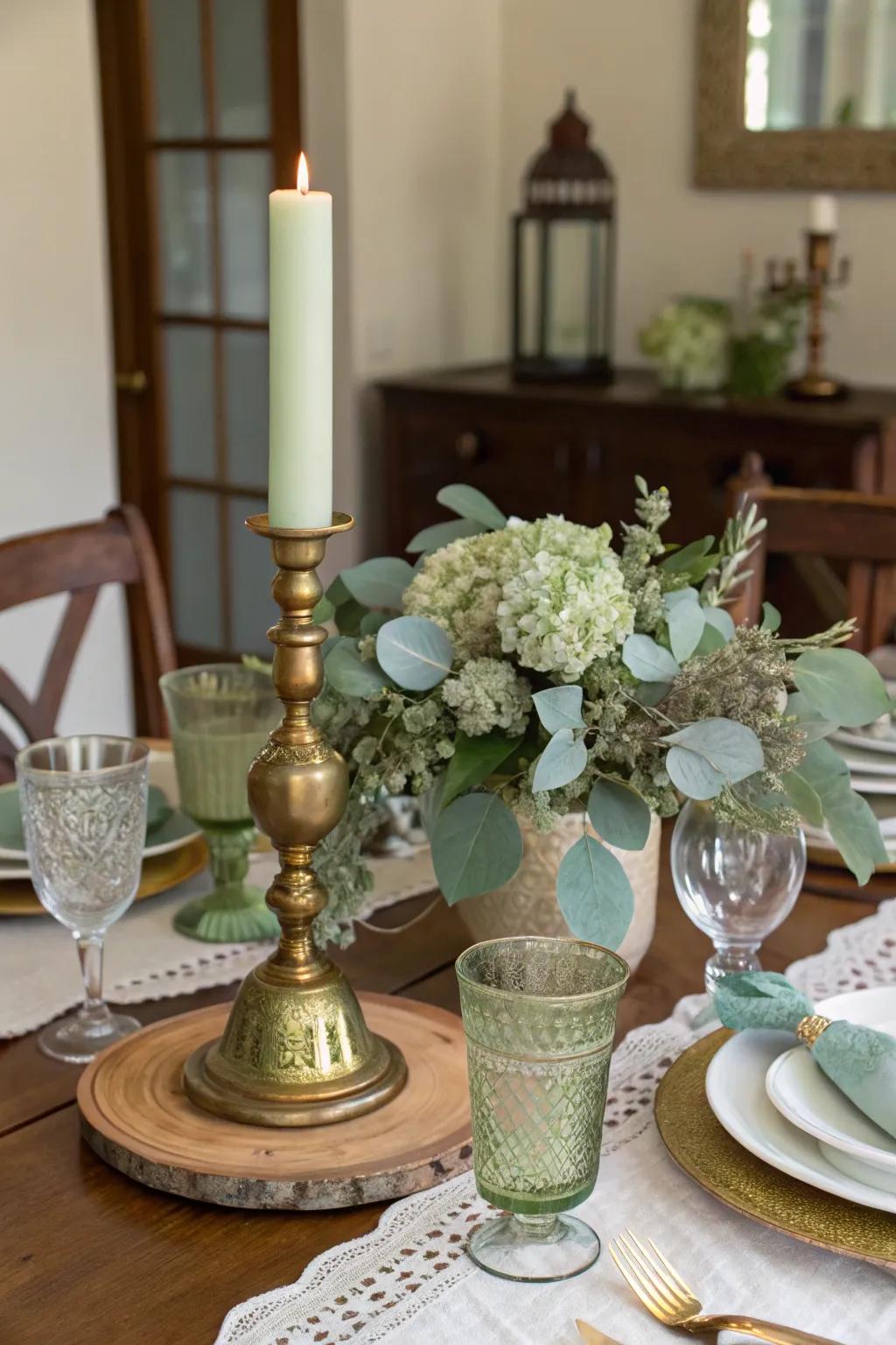 Brass accents impart a vintage allure to your sage green centerpiece.