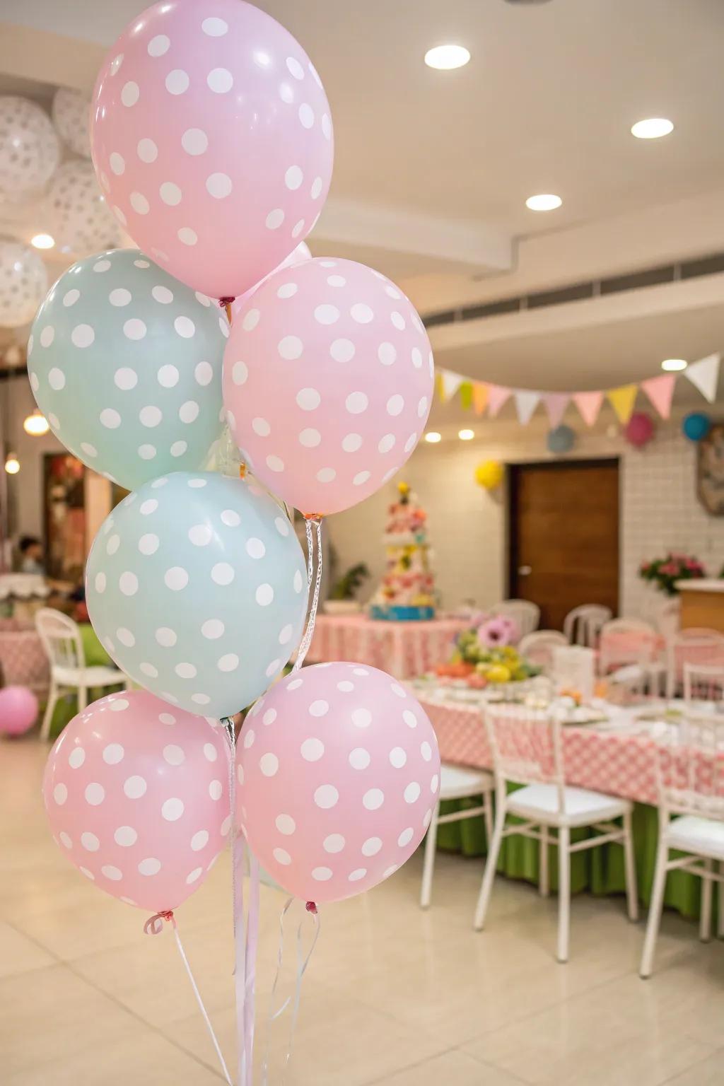 Polka dot balloons add a playful touch to the preppy decor.