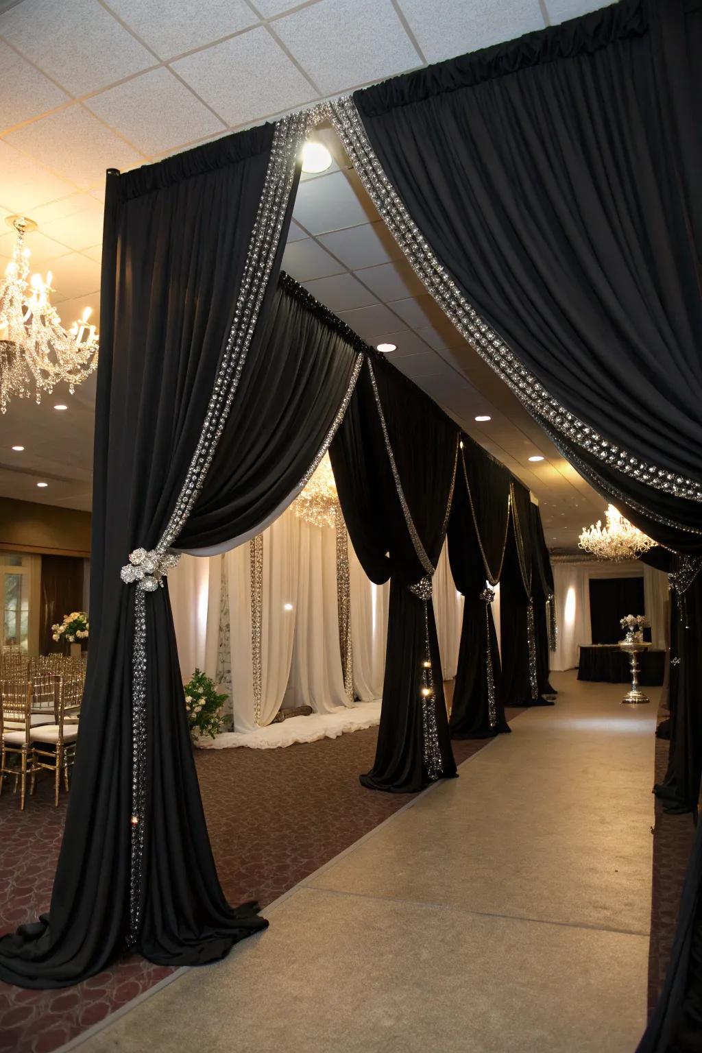 Dramatic cloth work in ebony and argent.
