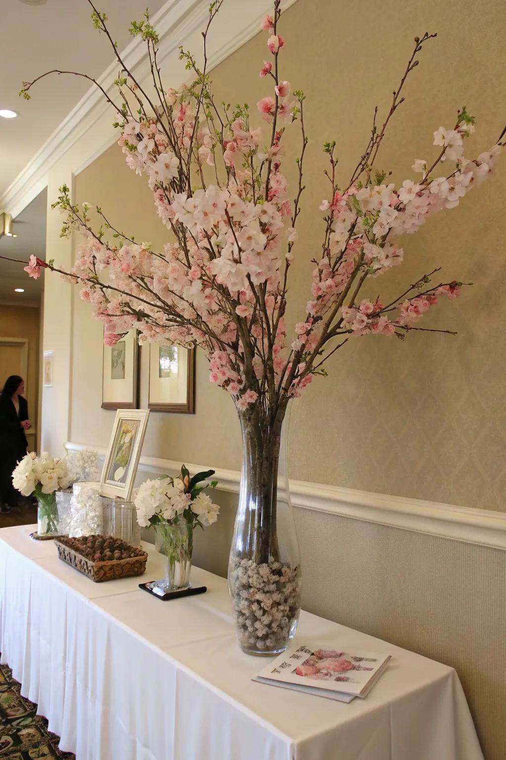 A stunning seasonal bough display featuring cherry blossoms.