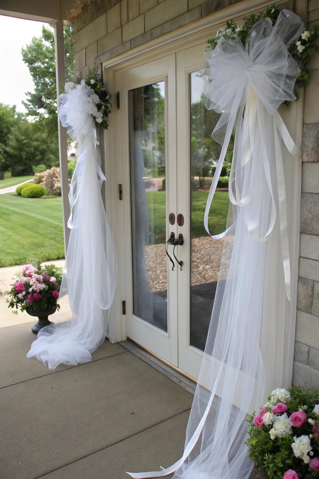 Airy fabric and decorative string craft a gentle, sophisticated entrance for your wedding day.