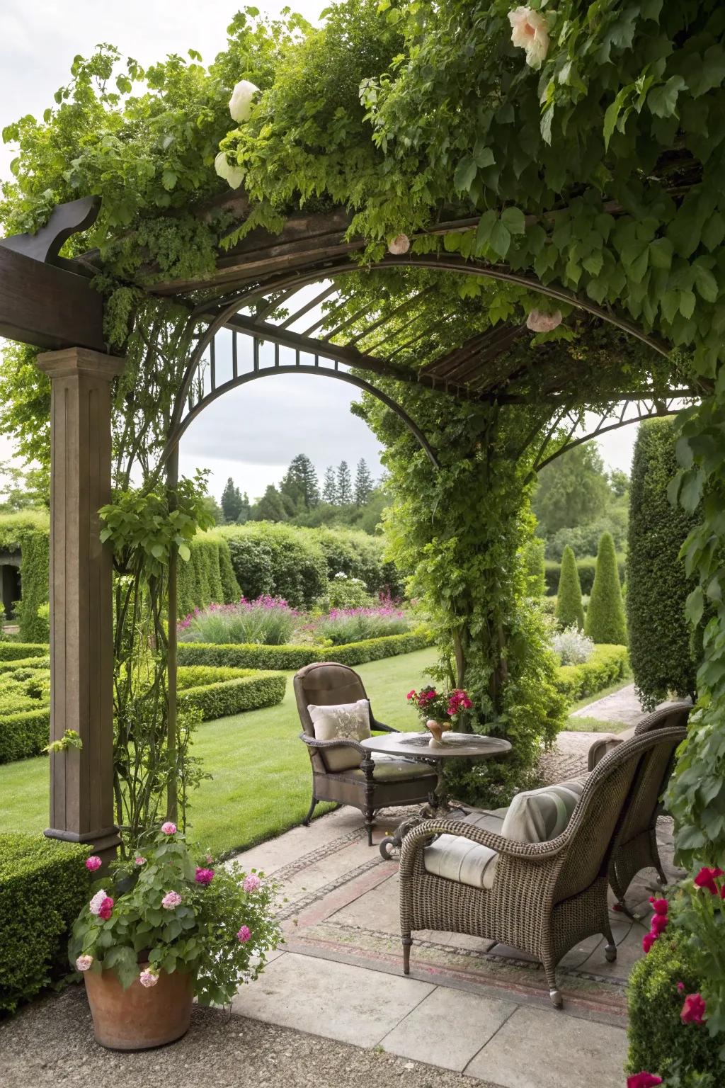 The quintessential spot to relax beneath a pergola lavishly draped with verdant foliage.