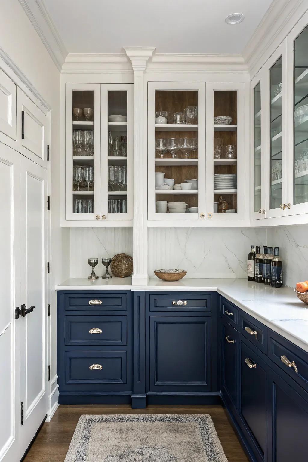 Chic dual-tone cabinets featuring an elegant navy and white.