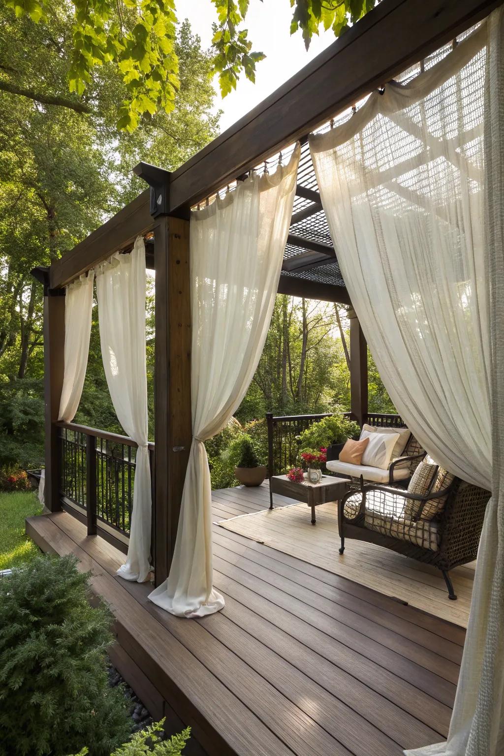 Flowing exterior drapes design a secluded and serene deck area.