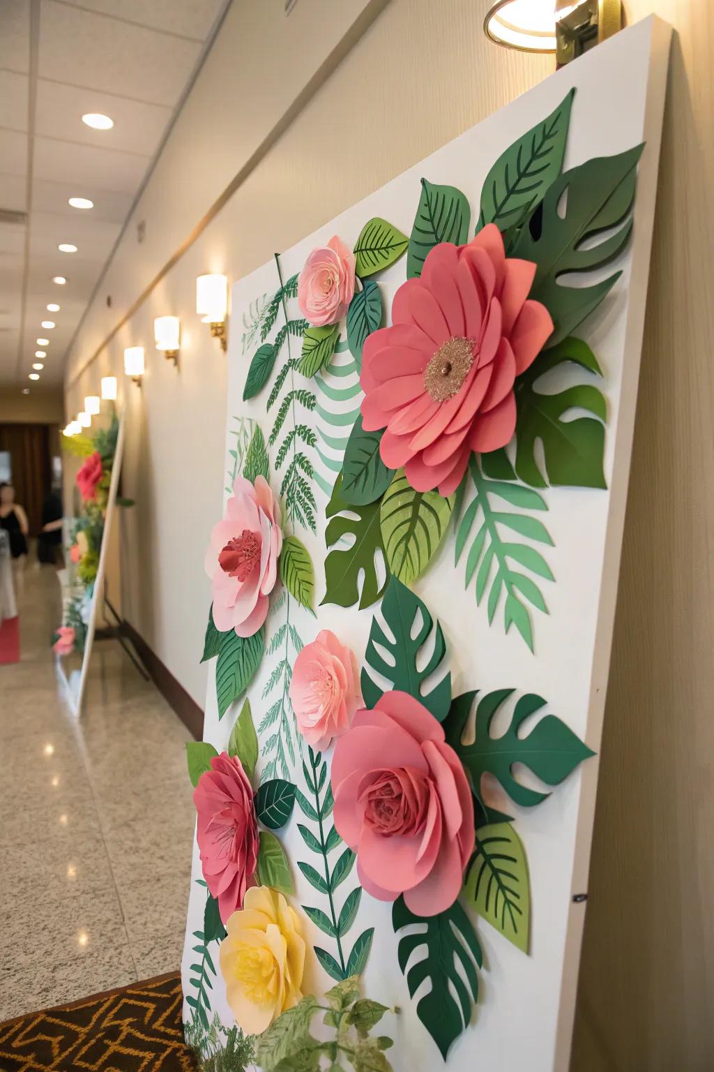 A board adorned with oversized paper flowers and lush green leaves.