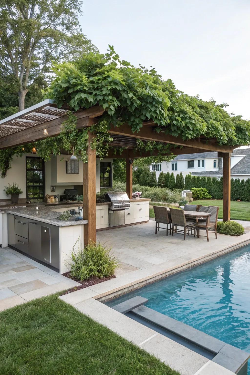 Pergola with outdoor kitchen improves poolside entertaining.