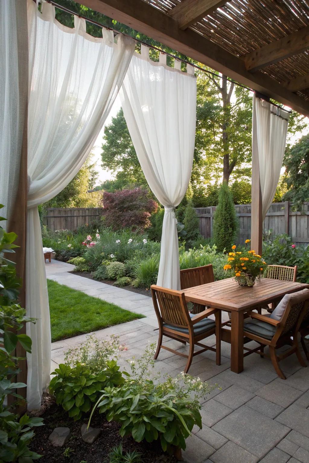Elegant outdoor drapes crafting a breezy private space.